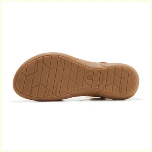 Detailed view of the slip-resistant brown rubber outsole with size 36 engraving