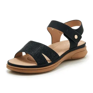 Women's wedge sandals with black rhinestone straps and adjustable ankle buckle closure