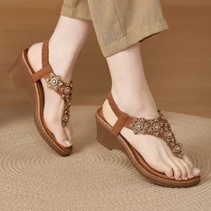 Women's wedge sandals with rhinestone floral embellishments and elastic heel strap