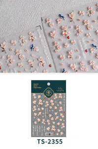 Detail showing TS-2355 5D nail art stickers with magnolia flowers and blue bird patterns