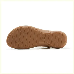 Detailed view of brown sandal sole with anti-slip texture and size 36 engraving