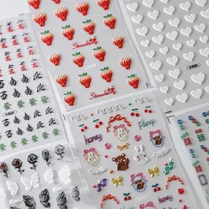 5D embossed nail art stickers featuring strawberry, heart, and mahjong pattern designs