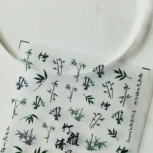 Chinese style bamboo nail stickers with elegant green leaf patterns and calligraphy