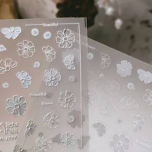Adesivi per unghie in rilievo 3D con motivi floreali bianchi e fiocchi traslucidi