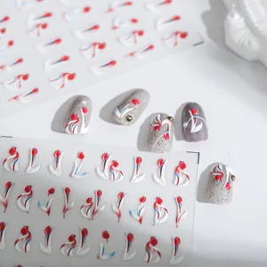 3D tulip nail stickers in red, blue, and white colors with applied effect on nail tips