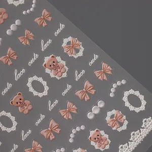 5D embossed nail art stickers with cute brown bears, pink bows, and lace patterns