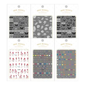 Mini nail art stickers set featuring heart, butterfly, and flower designs on white background