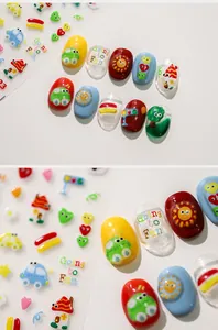 Detailed view of 3D embossed cartoon nail stickers with colorful car and sun designs