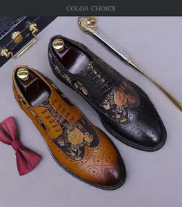 Detail of Brogue oxfords with gold floral embroidery and perforated wingtip patterns
