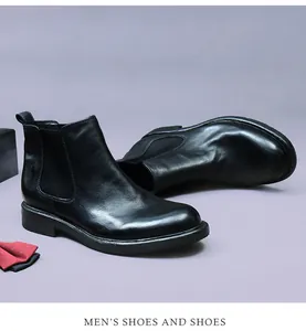 Détails de bottines Chelsea en cuir de cheval noir avec empiècements élastiques