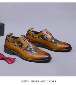 Detail of brown leather brogue shoes with intricate floral fabric stitching and laces