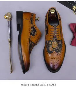 Macro view of brogue leather shoes featuring intricate yellow rose floral embroidery details
