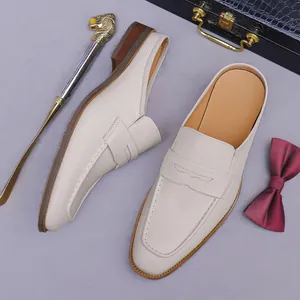 Handmade cream leather mule loafers for men with penny strap and premium wood grain sole