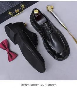 Detail of men's black leather formal shoes with classic lacing and premium wood shoe trees