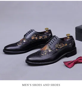 Detailed embroidery and brogue carvings on men's leather business shoes with shoe tree