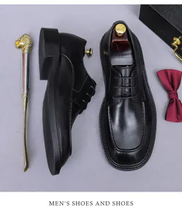 Detail of premium black leather men's dress shoes with polished finish and accessories