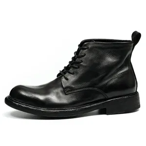 Men's black leather lace-up work boots with round toe and chunky rubber sole in retro style