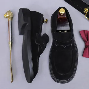 Classic men's black suede loafers with elegant round toe and durable rubber sole