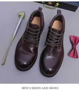 Detail of dark brown vintage horsehide boots with double stitching and retro props