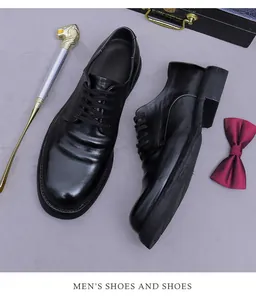 Herren Business-Schuhe aus schwarzem Leder mit Fliege und Schuhanzieher in edlem Look