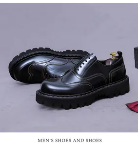 Detail of black leather oxford shoe featuring colorful stitching and heavy sawtooth sole