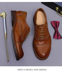 Klassische Oxford-Schuhe aus karamellfarbenem Leder mit eleganten Brogue-Details