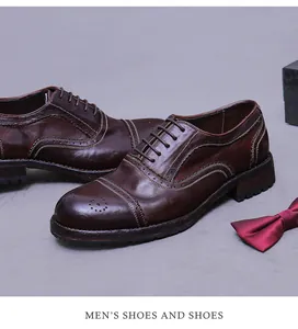Detail von braunen Vintage-Brogue-Lederschuhen mit feiner Schnitzerei und Goodyear-Finish