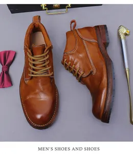 Detailed close-up of brown vintage leather men's boots with Goodyear welt stitching