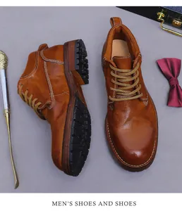 Top-down view of brown leather vintage boots with white stitching and durable rubber soles