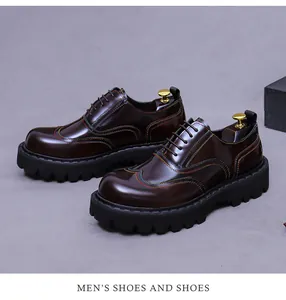 Detailed macro view of dark brown leather oxford shoes with colorful stitching and brogue patterns