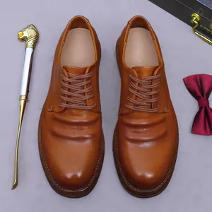 Derbies pour hommes en cuir marron avec texture plissée et semelle artisanale Goodyear