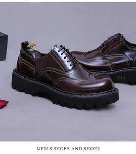 Detailed view of burgundy leather oxford shoes with rainbow stitching and thick rubber soles