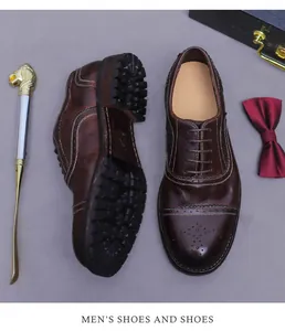 Nahaufnahme brauner Budapester Schuhe mit Flügelkappe und dicker Gummisohle