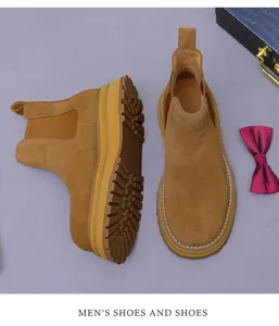Detail view of camel suede Chelsea boot showing thick rubber sole and side elastic panel