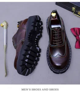 Macro detail of dark reddish brown leather oxford shoes with contrast stitching and lug sole