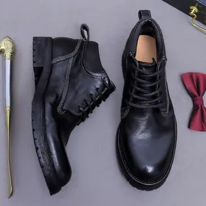 Men's vintage leather combat boots with white stitching and non-slip sole in matte finish