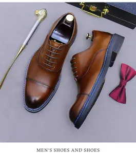 Braune Leder-Oxfords mit polierter Kappe und blauen Nähten für Herrenanzüge