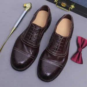 Klassische dunkelbraune Leder-Oxfordschuhe für Herren mit edlem Brogue-Geschäftsstil