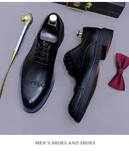 Detail von schwarzen Business-Schuhen mit gewebter Textur und blauer Kontrastnaht
