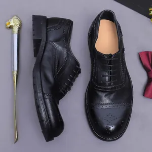 Klassische schwarze Brogue-Oxford-Herrenschuhe aus Leder mit Cap-Toe und Gummisohle