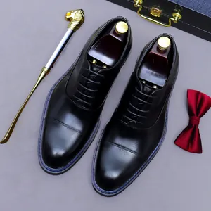 Klassische schwarze Oxford-Schuhe für Herren aus Leder mit blauen Ziernähten