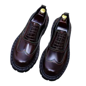 Brown leather Oxford shoes for men with thick soles and colorful contrast stitching details