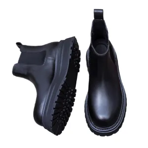 Mens retro brushed suede Chelsea boots with thick rubber soles in a matte black finish