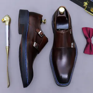 Scarpe monk strap da uomo in pelle testa di moro con eleganti cuciture blu a contrasto