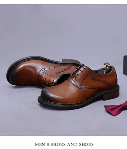 Macro view of burnished brown leather oxford shoe with intricate wingtip broguing details