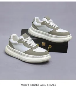 Detailed close-up of men's leather platform sneaker in white and grey colors