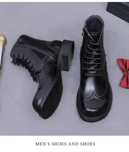 Dettaglio intaglio Brogue su stivali in pelle nera con lacci e cerniera laterale in metallo