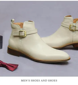 Detailed view of beige leather men's boot with metallic buckle and wooden textured heel