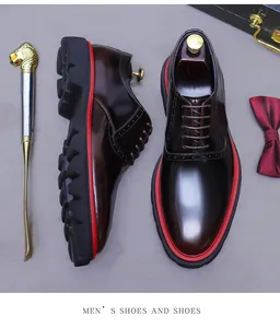 Top view of shiny oxblood leather brogues with chunky lug soles and vintage details