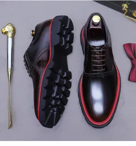 Detailed view of burgundy Oxford shoes featuring brogue details and a thick platform sole
